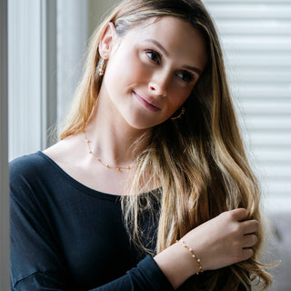 Stunning Crystal in Gold 1.25" Cubic Zirconia Hoop Earrings