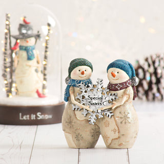 Sisters 4.5" Snowwomen holding snowflake